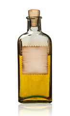 Old fashioned drug bottle with label, isolated.