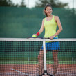 © lightpoet - pretty, young female tennis player on the tennis court