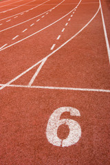 Sticker - Number six on the start of a running track