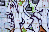 Fototapeta Młodzieżowe - Colorful graffiti on a wall