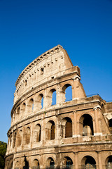 Wall Mural - Colosseum with blue sky