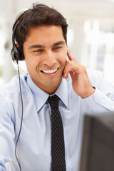 Wall Mural - Businessman wearing headset