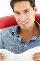 Wall Mural - Young man reading