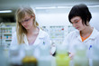 © lightpoet - two female researchers in a chemistry lab