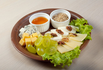 Wall Mural - Arrangement ofcheese,grape, nuts