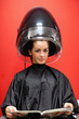 © WavebreakmediaMicro - Portrait of a young woman under a hairdressing machine