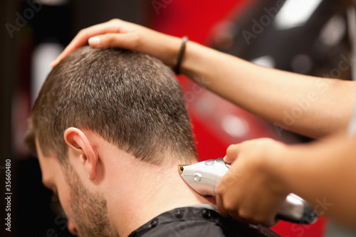 Fotomural Close up of a male student having a haircut