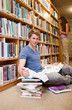 © WavebreakmediaMicro - Portrait of a student doing research while his classmate is read