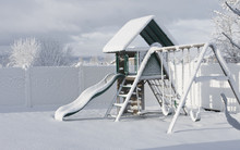 A Playground Covered In Freshly Fallen Snow