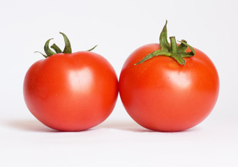 Canvas Print - Two tomatoes isolated on white background