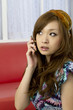 © one - Asian beautiful woman talking by mobile phone