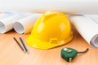 © Elnur - Drawings and hard hat on the desk