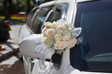 Wedding Bouquet On Limo