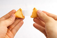 Fortune Cookie Being Pulled Apart With A Blank Fortune