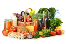 Groceries In Wicker Basket Including Vegetables And Fruits