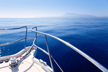 Boat bow sailing in blue Mediterranean sea