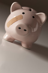 Piggy Bank with Bandage on Face