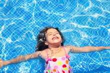 Brunette Children Girl Swimming Blue Tiles Pool
