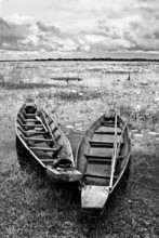 Abandoned Native Thai Style Wood Boat In Black And White