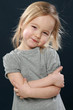 © VitCOM - Portrait of a happy young girl in studio