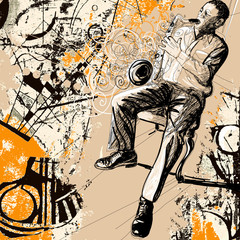 Wall Mural - saxophonist on a grunge background