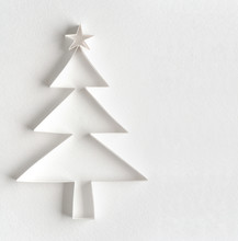 Christmas Tree Made Of Paper On White Background