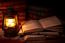 Old Oil Lamp And Old Books