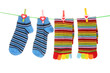 © Africa Studio - bright  socks on a line is isolated on a white