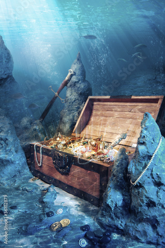 open treasure chest with bright gold underwater
