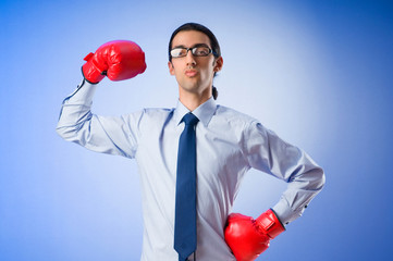 Businessman with boxing gloves