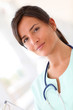 © goodluz - Portrait of beautiful smiling nurse