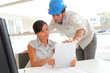 © goodluz - Architects working in office with electronic tablet