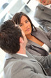 © goodluz - Group of business people in a meeting