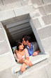 © goodluz - In loved couple standing in their future house