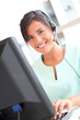 © goodluz - Portrait of beautiful nurse with headset on