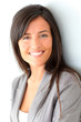 © goodluz - Beautiful businesswoman standing on grey background