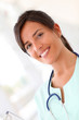 © goodluz - Portrait of beautiful smiling nurse