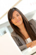 © goodluz - Portrait of beautiful businesswoman at work