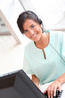 © goodluz - Portrait of beautiful nurse with headset on