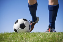 Kicking The Soccer Ball (close Up View)