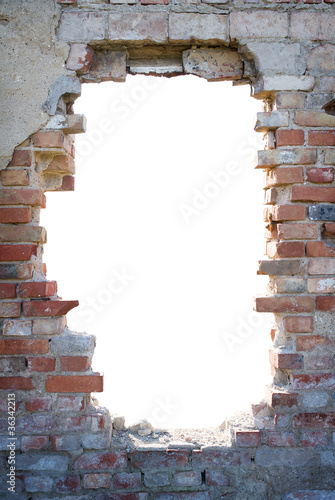 Fotomural Hole in the brick wall with copy space
