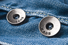 Closeup Detail Of A Blue Jeans