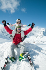 Wall Mural - Ski, snow, sun and fun - happy family on winter vacation