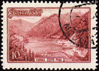 Wall Mural - Lake Riza in Caucasus on post stamp