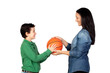 © Gelpi - Mother handing a basketball to his son