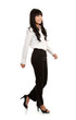 © Odua Images - Full body portrait of walking businesswoman