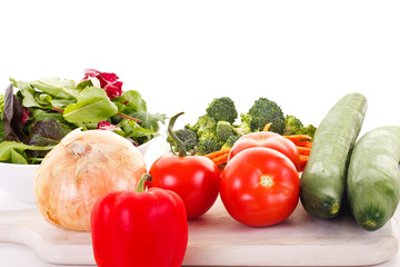 Wall Mural - Fresh Salad Ingredients on Cutting Board