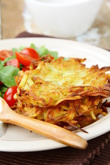 Wall Mural - potato pancakes with dill and sour cream