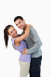© WavebreakmediaMicro - Young couple hugging each other