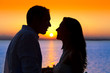 © lunamarina - couple sunset profile back light in orange sea